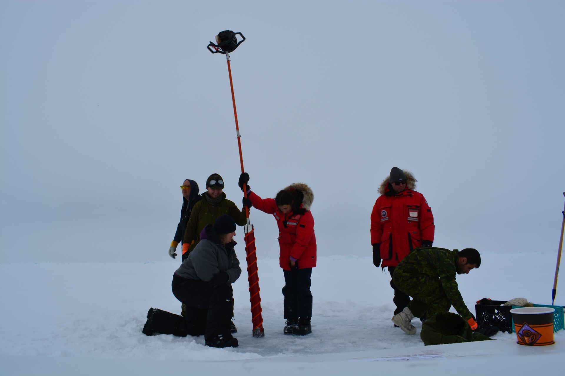 Erika Bullen working with the observatory crew in Alert, Nunavut