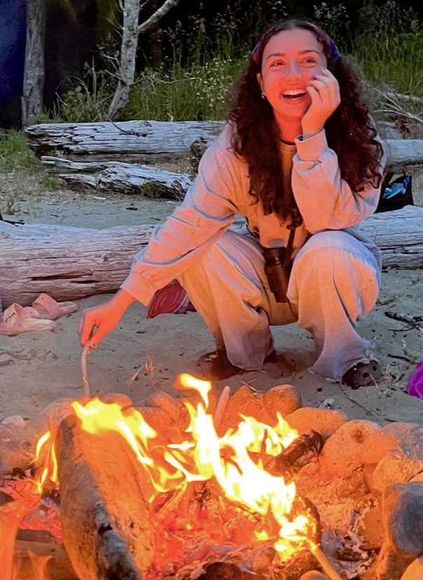 Chloe Nasrala on the beach after a day of research in the lab